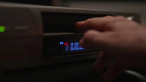Videotape inserted in vhs vcr and play 库存影片 337052697