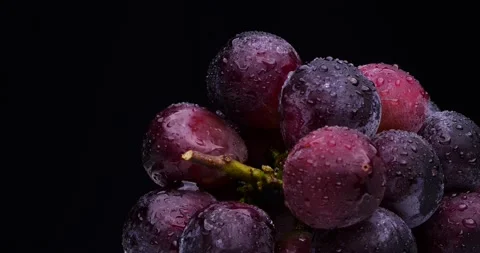 Videotaping large grapes on a rotating table. Stock Footage 198800785