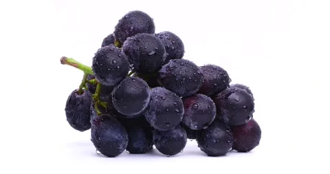 Videotaping large grapes on a rotating table. Video stock 201174132
