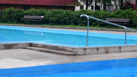 Vief of swimming pool. Abandoned swimming pool during summer time Stock Footage