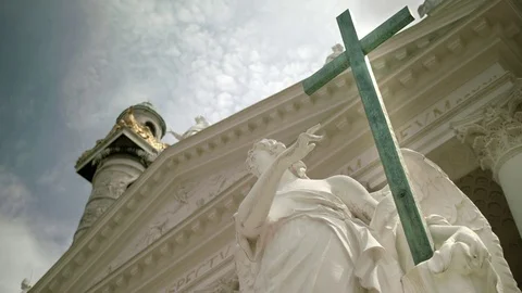 Vienna Angel at Karlskirche and cross from underneath – medium Stock Footage