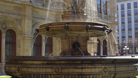 Vienna, Austria October 2018. The Opera fountain at Vienna State Opera House Stock Footage 99532006
