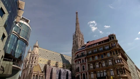 Vienna downtown Stephansdom - wide pan to other building Stock Footage