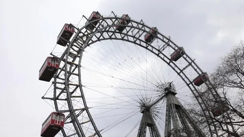 The Vienna Ferris Wheel rotating on a cloudy day Stock Footage 303505750