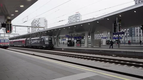 Vienna Main Station during Winter. People on Platform on way to Rail jet Train Stock Footage 231226378