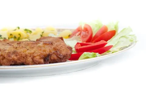 Vienna steak with vegetables Stock Photos