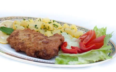 Vienna steak with vegetables Stock Photos