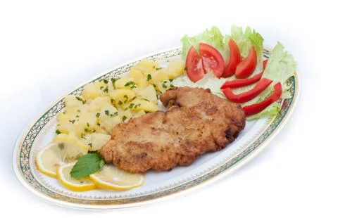 Vienna steak with vegetables Stock Photos