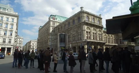 Viennese sausages queue, Vienna State Opera in background, Austria stock footage Video stock 135905379