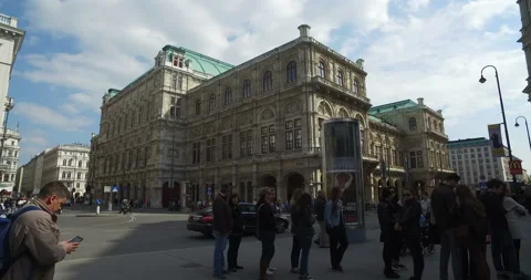 Viennese sausages queue, Vienna State Opera in background, Austria stock footage Video stock 135905488