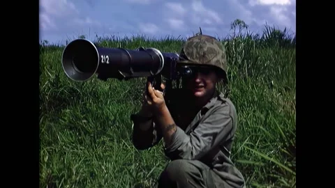 VIEQUES - 1952 - The soldier shoulders the rocket launcher, aligns the sights, Stock Footage 312747151
