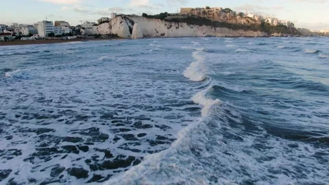 Vieste, Italy - Drone approach over waves Stock Footage 221581101