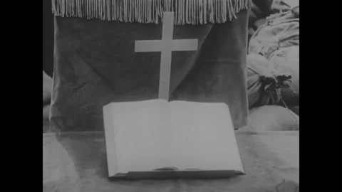 VIETNAM - 1965 - A US Army chaplain holds mass for soldiers in Vietnam as Stock Footage 340649029