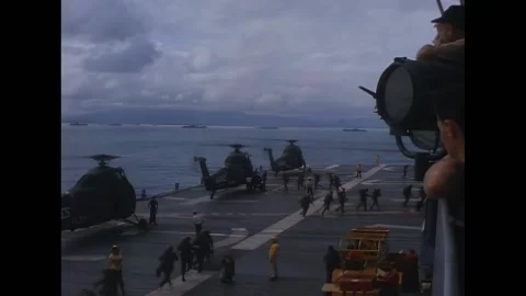 VIETNAM - 1966 - Marines running down white line on flight deck to man the Stock Footage 316680143