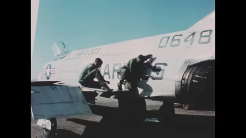 VIETNAM - 1966 - US Marines begin repairing the side of an F4H-1 Phantom jet. Stock-Footage 340654606