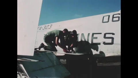 VIETNAM - 1966 - US Marines begin repairing a wing on an F4H-1 Phantom jet. Stock-Footage 340654690