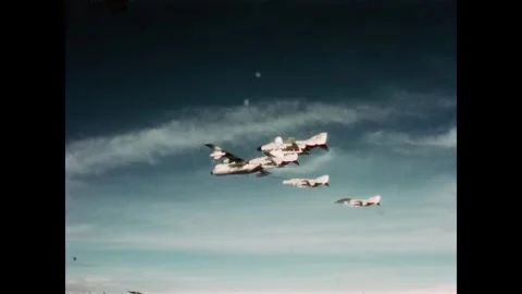 VIETNAM - 1966 - View beneath a squadron of KC-130 and F-4H Phantom II planes Stock-Footage 340583884