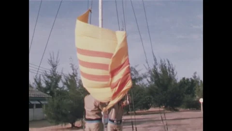 VIETNAM - 1968: Air Force Training - Striped Flag at Parade Ground Stock Footage 343935762