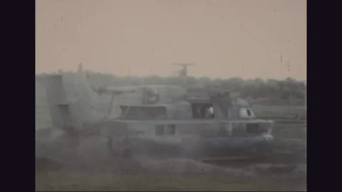 VIETNAM - 1968: Hovercraft at rest in a flooded rice paddy Stock Footage 341698266