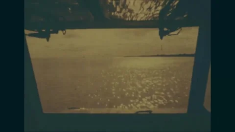 VIETNAM - 1968: Spray across the bow window of a hovercraft Stock Footage 341698341