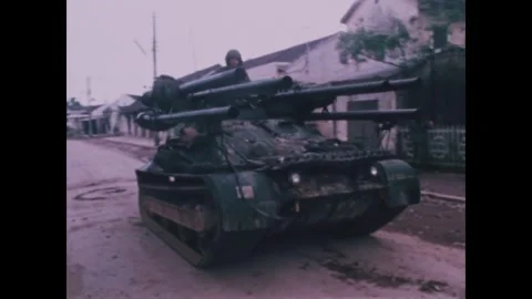 VIETNAM - 1968 - US Marines fire from a small tank on the banks of the Perfume Vidéo 340575663