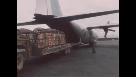 VIETNAM - 1968 - US Marines load supplies onto a KC-130F plane, which are then Video stock 340575583