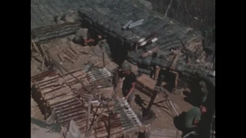 VIETNAM - 1970: Firebase Withdrawal - Shells stacked in a hilltop gun pit 스톡 동영상 344000496