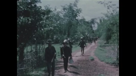 VIETNAM - 1970: Point men - Two men lead the column Stock Footage 344004104
