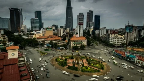 Vietnam 4K Timelapse of the Ho Chi Minh  Roundabout in front of Ben Thahn market Stock Footage 86297768