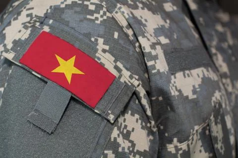 Vietnam army uniform patch flag on soldiers arm. Military Concept Stock Illustration