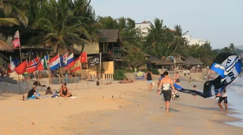 Vietnam beach in Mui Ne. Getting ready to Kite surf Stock Footage 18174763