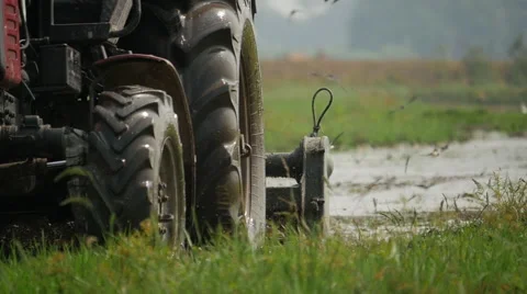 Vietnam tractor rice fields 3 Stock Footage 64571193