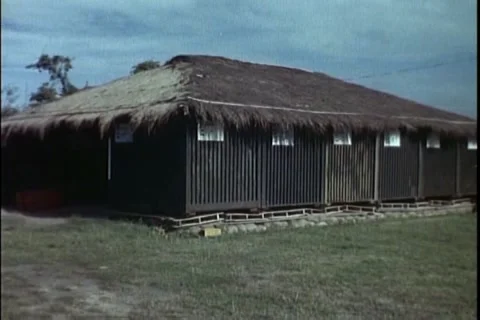 Vietnam War - Cargo boxes used for huts in Vietnam War archival Stock Footage 139690795