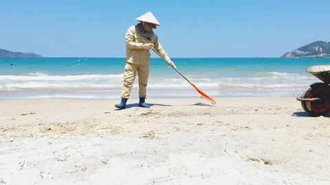 Vietnamese beach clean-up crew picking up rubbish. Stock Footage 211808167