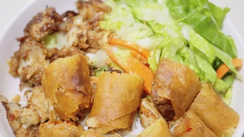 Vietnamese Bun Cha Gio Noodle Bowl with Crispy Spring Rolls Stock Footage 346008787