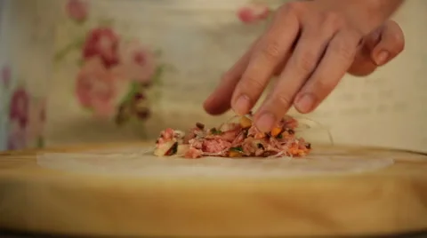 Vietnamese chef making traditional spring rolls. Stock Footage 51741302