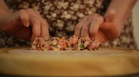 Vietnamese chef making traditional spring rolls. Stock Footage 51741310