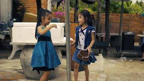 Vietnamese Children Dancing in Slow Motion Stockbeeldmateriaal 99104748