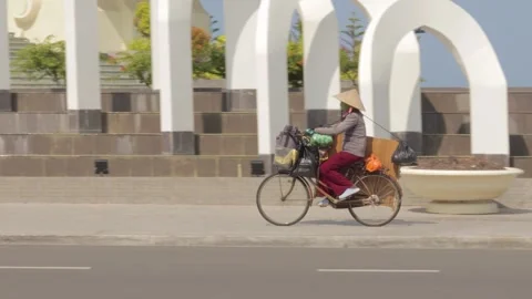Vietnamese cyclist on the move Video stock 241493603