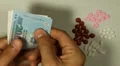 Vietnamese Dong VND, Counting Drugs and Money, Health Care, Colorful Pills HD Footage