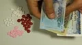 Vietnamese Dong VND, Counting Drugs and Money, Health Care, Colorful Pills HD Footage