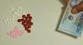 Vietnamese Dong VND, Counting Drugs and Money, Health Care, Colorful Pills HD Footage