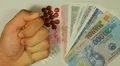 Vietnamese Dong VND, Counting Drugs and Money, Health Care, Colorful Pills HD Footage