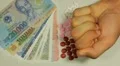 Vietnamese Dong VND, Counting Drugs and Money, Health Care, Colorful Pills HD Footage