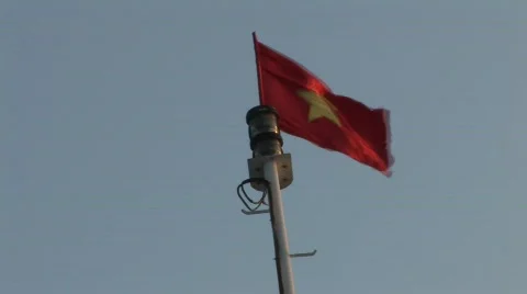 Vietnamese flag blowing in wind Stock Footage 290560