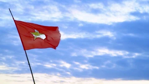 The Vietnamese flag develops on a top of the fishing boat. The red flag develops Video stock 84608572