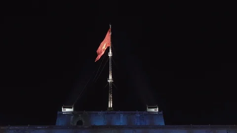 Vietnamese Flag fly over Imperial City Building, Hue, Vietnam Stock Footage 113664357