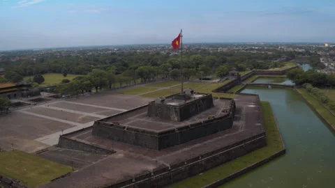 Vietnamese flag flying over imperial citadel of hue Stock Footage 329510071