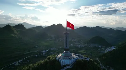 Vietnamese Flag Flying Over Lung Cu Flag Tower in Ha Giang, Vietnam Stock Footage 334619375