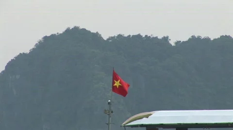 Vietnamese Flag &amp; mountains Stock Footage 290638